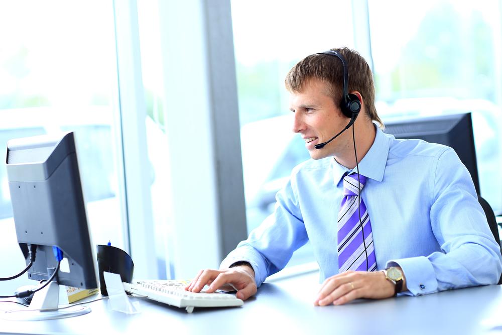 employee taking a call without a physical phone