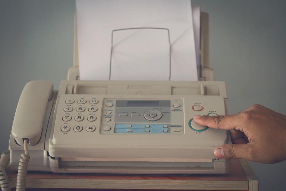 VoIP's virtual fax feature lets users send and receive faxes, minus the wasted paper, expensive ink and toner cartridges, and clunky fax machine. old fax machine
