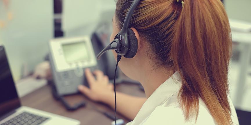 employee using a VoIP phone